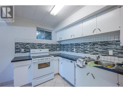 102 Derenzy Place, Penticton, BC - Indoor Photo Showing Kitchen With Double Sink