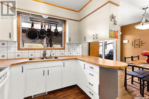 78 Aitken Crescent, Regina, SK - Indoor Photo Showing Kitchen With Double Sink