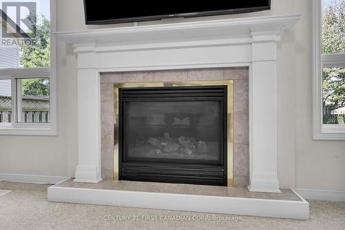 250 White Sands Drive, London, ON - Indoor Photo Showing Living Room With Fireplace