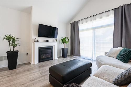 39 Cosmopolitan Common, St. Catharines, ON - Indoor Photo Showing Living Room With Fireplace