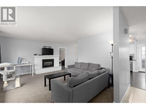 3702 22 Street, Vernon, BC - Indoor Photo Showing Living Room With Fireplace