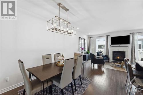 13 Brixton Way, Ottawa, ON - Indoor Photo Showing Dining Room With Fireplace