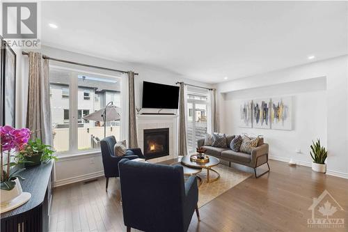 13 Brixton Way, Ottawa, ON - Indoor Photo Showing Living Room With Fireplace