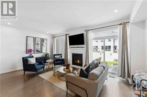 13 Brixton Way, Ottawa, ON - Indoor Photo Showing Living Room With Fireplace