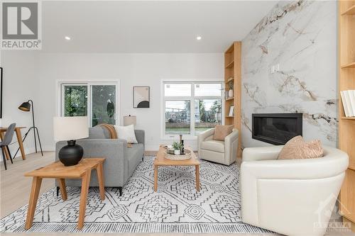 8 Melville Drive, Ottawa, ON - Indoor Photo Showing Living Room With Fireplace