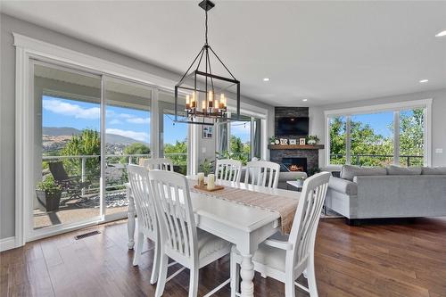 928 34 Avenue, Vernon, BC - Indoor Photo Showing Dining Room With Fireplace