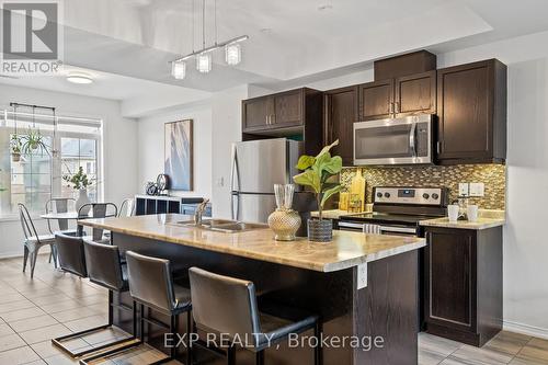 12 - 5060 Serena Drive, Lincoln, ON - Indoor Photo Showing Kitchen With Stainless Steel Kitchen With Upgraded Kitchen