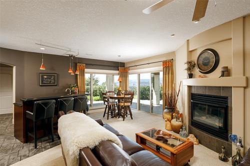 648 Denali Drive, Kelowna, BC - Indoor Photo Showing Living Room With Fireplace