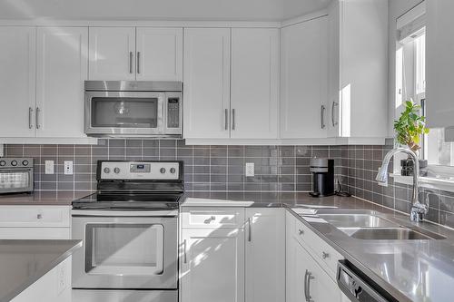 80-2490 Tuscany Drive, West Kelowna, BC - Indoor Photo Showing Kitchen With Stainless Steel Kitchen With Double Sink