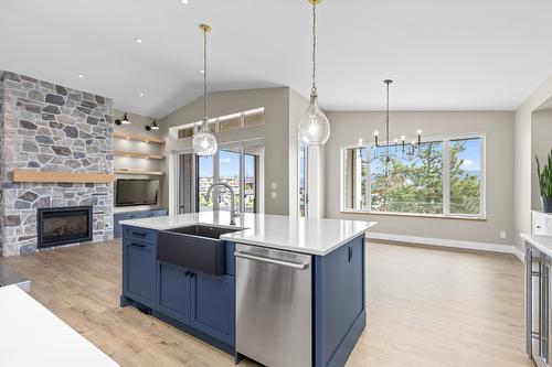 196 Summer Wood Drive, Kelowna, BC - Indoor Photo Showing Kitchen With Fireplace With Upgraded Kitchen