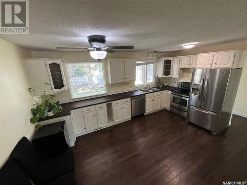 126 Bothwell Crescent, Regina, SK - Indoor Photo Showing Kitchen With Double Sink