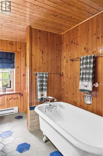 This large antique clawfoot soaker tub has been refinished. - 579 Cape Hurd Road, Tobermory, ON - Indoor