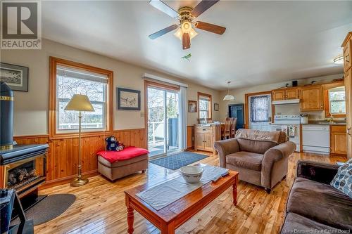 2840 127 Highway Unit# 6, Bayside, NB - Indoor Photo Showing Living Room With Fireplace