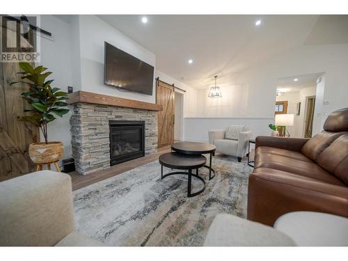 9833 Osprey Landing Drive, Wardner, BC - Indoor Photo Showing Living Room With Fireplace