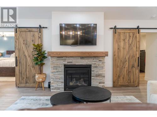 9833 Osprey Landing Drive, Wardner, BC - Indoor Photo Showing Living Room With Fireplace