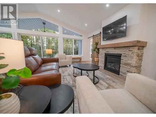 9833 Osprey Landing Drive, Wardner, BC - Indoor Photo Showing Living Room With Fireplace