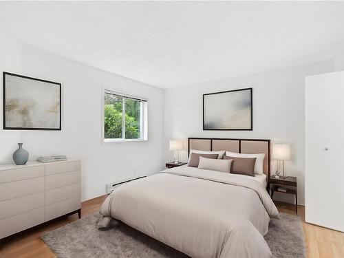 101-1714 Fort St, Victoria, BC - Indoor Photo Showing Bedroom