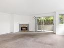 101-1714 Fort St, Victoria, BC  - Indoor Photo Showing Living Room With Fireplace 