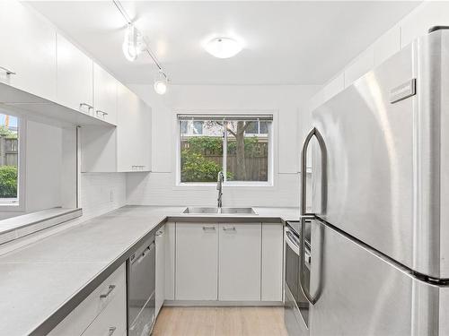 101-1714 Fort St, Victoria, BC - Indoor Photo Showing Kitchen With Stainless Steel Kitchen With Double Sink