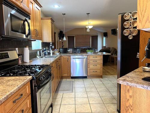 1661 Bann Street, Merritt, BC - Indoor Photo Showing Kitchen With Double Sink