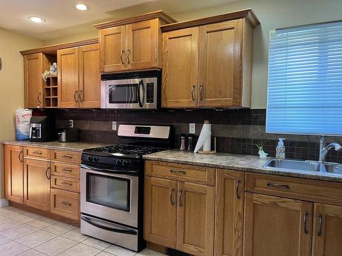 1661 Bann Street, Merritt, BC - Indoor Photo Showing Kitchen With Double Sink