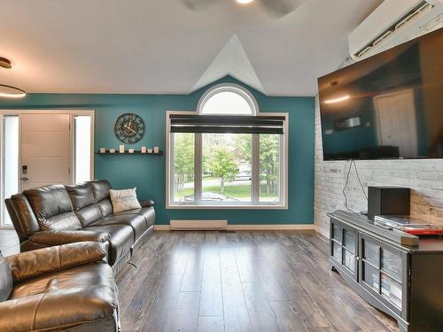 Living room - 781 Rue Du Soleil, L'Épiphanie, QC - Indoor Photo Showing Living Room With Fireplace