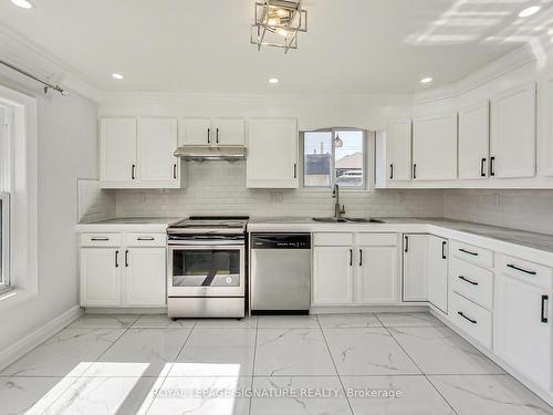 763 Tate Ave, Hamilton, ON - Indoor Photo Showing Kitchen With Double Sink