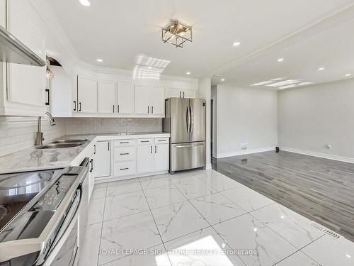 763 Tate Ave, Hamilton, ON - Indoor Photo Showing Kitchen With Double Sink