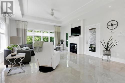 6686 Yacht Boulevard, Cornwall, ON - Indoor Photo Showing Living Room With Fireplace