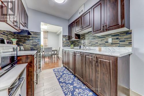 1604 - 100 Prudential Drive, Toronto (Dorset Park), ON - Indoor Photo Showing Kitchen