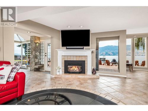 8180 Tronson Road, Vernon, BC - Indoor Photo Showing Living Room With Fireplace