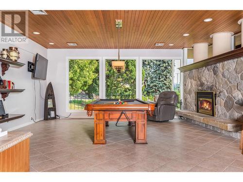 8180 Tronson Road, Vernon, BC - Indoor Photo Showing Other Room With Fireplace