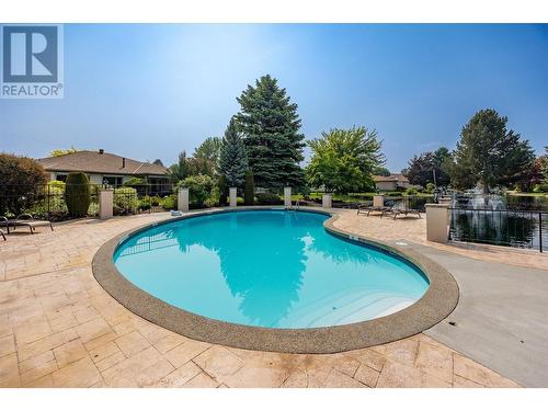 1201 Cameron Avenue Unit# 54, Kelowna, BC - Outdoor With In Ground Pool With Backyard