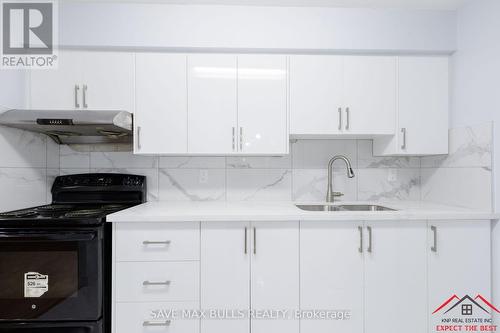 617 - 100 Dundalk Drive, Toronto, ON - Indoor Photo Showing Kitchen With Double Sink