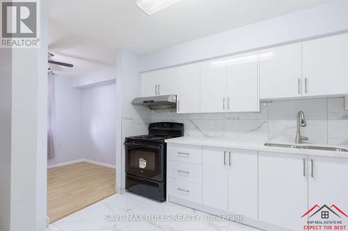 617 - 100 Dundalk Drive, Toronto (Dorset Park), ON - Indoor Photo Showing Kitchen