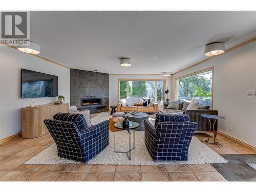 8349 Okanagan Landing Road, Vernon, BC - Indoor Photo Showing Living Room With Fireplace