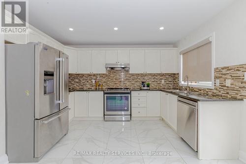 12 Benmore Crescent, Brampton (Vales Of Castlemore), ON - Indoor Photo Showing Kitchen With Stainless Steel Kitchen With Double Sink With Upgraded Kitchen