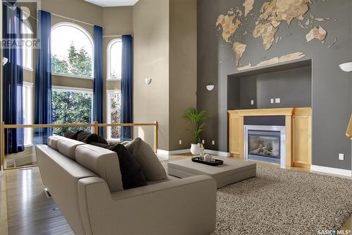 14 Emerald Ridge, White City, SK - Indoor Photo Showing Living Room With Fireplace