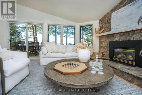 9848 Huron Place, Lambton Shores (Grand Bend), ON - Indoor Photo Showing Living Room With Fireplace