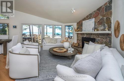 9848 Huron Place, Lambton Shores (Grand Bend), ON - Indoor Photo Showing Living Room With Fireplace