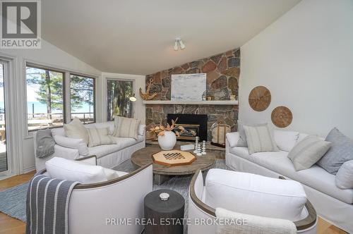 9848 Huron Place, Lambton Shores (Grand Bend), ON - Indoor Photo Showing Living Room With Fireplace