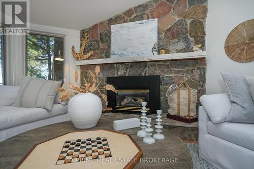 9848 Huron Place, Lambton Shores (Grand Bend), ON - Indoor Photo Showing Living Room With Fireplace