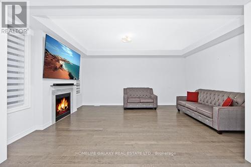 165 Wesmina Avenue, Whitchurch-Stouffville, ON - Indoor Photo Showing Living Room With Fireplace