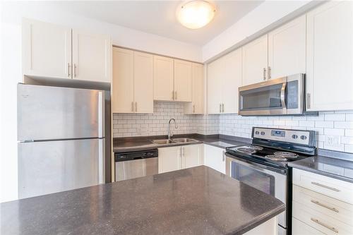 2490 Old Bronte Road|Unit #521, Oakville, ON - Indoor Photo Showing Kitchen With Stainless Steel Kitchen With Double Sink With Upgraded Kitchen