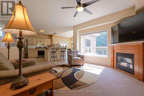 1 Kirbys Way, Huntsville, ON - Indoor Photo Showing Living Room With Fireplace