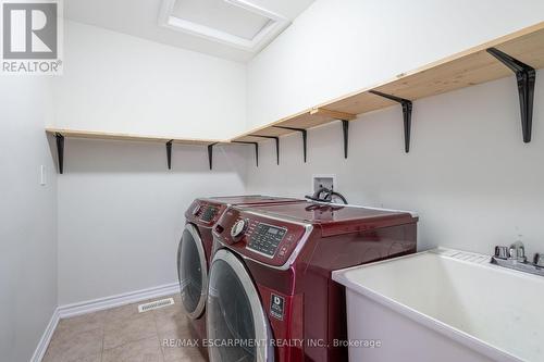 7 Brigham Avenue, Hamilton (Binbrook), ON - Indoor Photo Showing Laundry Room