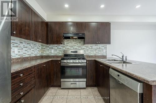 7 Brigham Avenue, Hamilton (Binbrook), ON - Indoor Photo Showing Kitchen With Double Sink