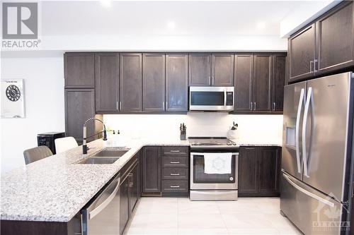 4372 Kelly Farm Drive, Ottawa, ON - Indoor Photo Showing Kitchen With Stainless Steel Kitchen With Double Sink With Upgraded Kitchen