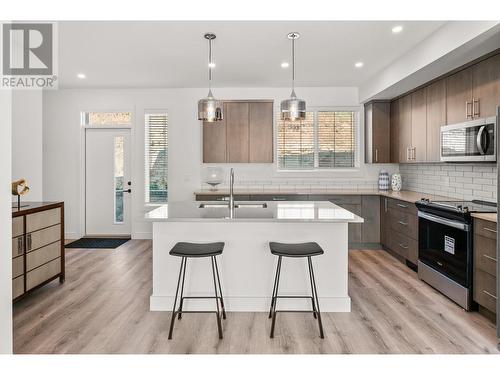 610 Academy Way Unit# 117, Kelowna, BC - Indoor Photo Showing Kitchen With Double Sink With Upgraded Kitchen