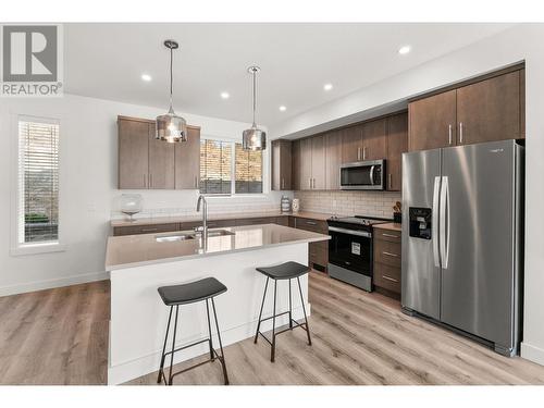 610 Academy Way Unit# 117, Kelowna, BC - Indoor Photo Showing Kitchen With Stainless Steel Kitchen With Upgraded Kitchen